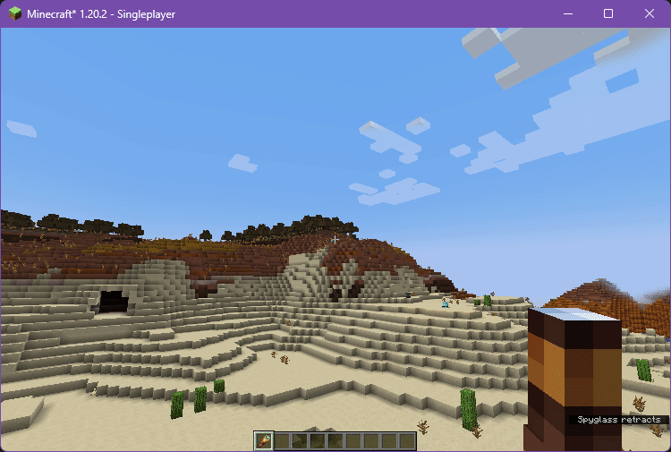 A GIF showing the rangefinder added to spyglasses, indicating the distance and names of blocks and mobs hovered.