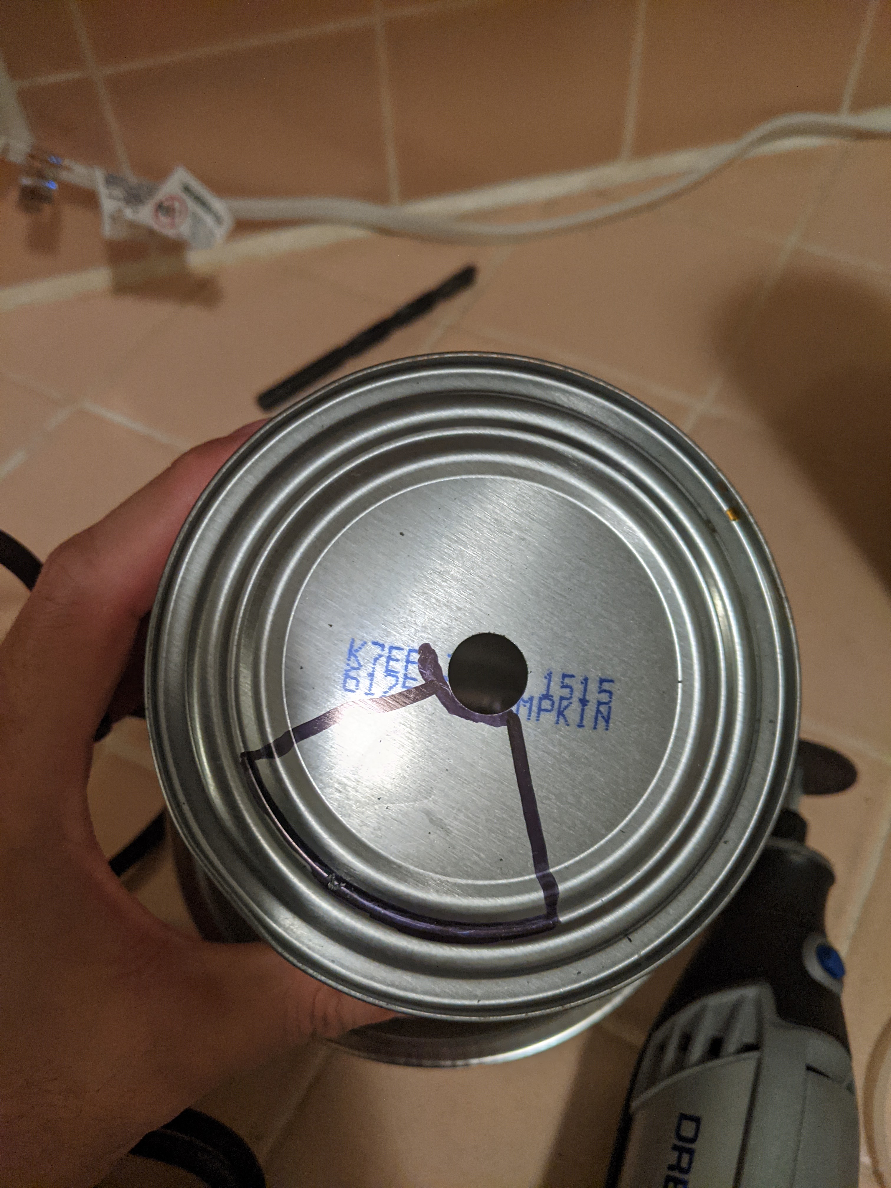 Can with hole in it