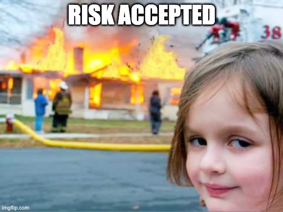 Girl smiling in front of house in fire meme, with text "risk accepted" added