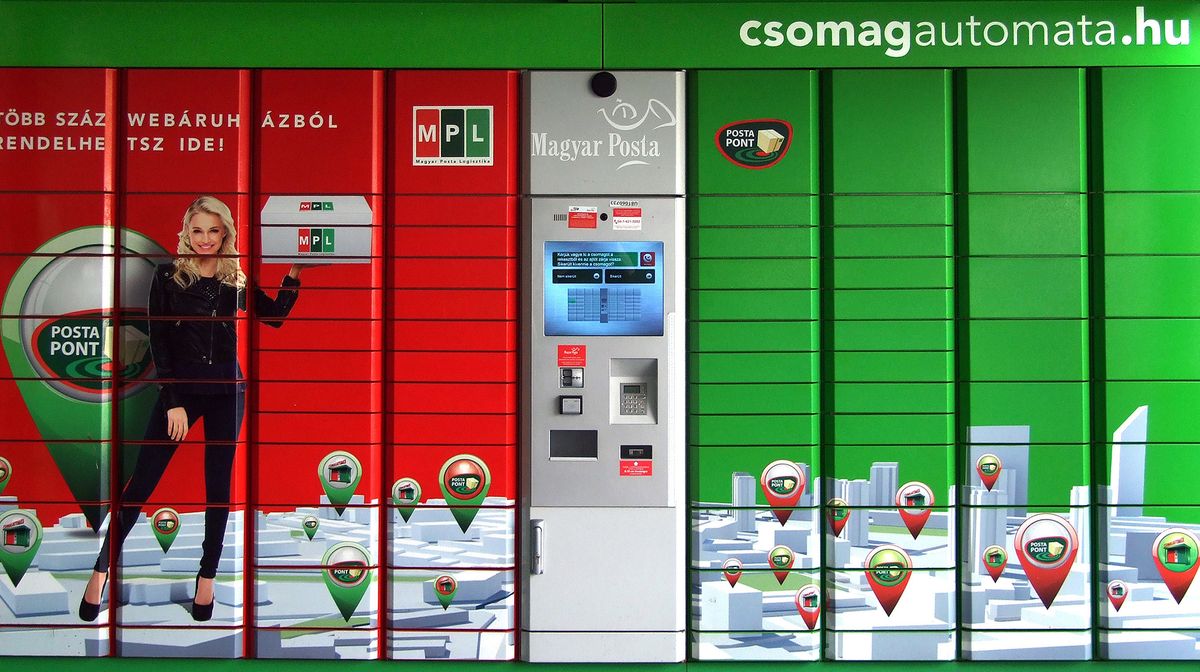 A package locker system with a colorful design, featuring the Magyar Posta logo, a touchscreen interface, and illustrated maps with pinpoint markers. A woman holds a parcel on the left side of the image.