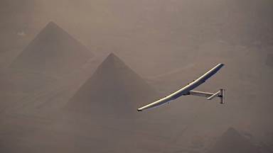 Solar Impulse 2 flying over the pyramids in Giza, Egypt (© Jean Revillard/Solar Impulse2 via Getty Images)