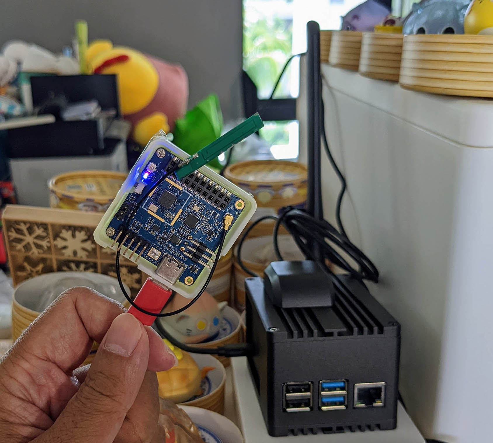 Pine64 PineDio Stack BL604 (left) talking LoRaWAN to RAKwireless WisGate (right)