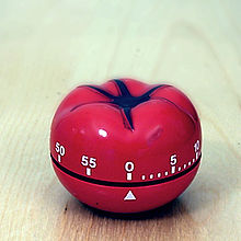 A Pomodoro kitchen timer, after which the method is named