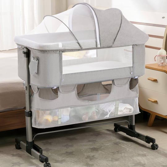 cuddor-bedside-bassinet-for-baby-bedside-sleeper-with-wheels-heigt-adjustable-with-mosquito-nets-lar-1