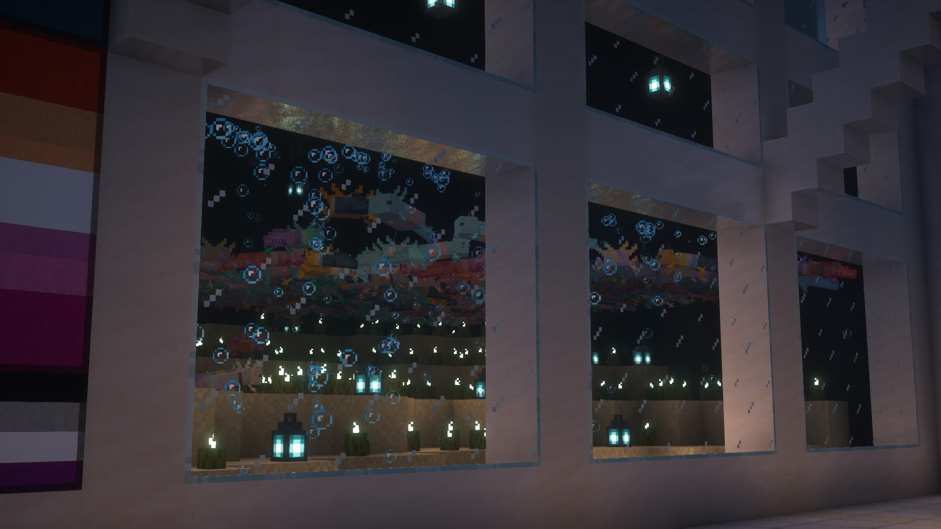 An aquarium full of axolotls with Pridepack textures