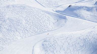 Skier at Bernina Pass, Graubünden, Switzerland (© Francesco Bergamaschi/Getty Images)