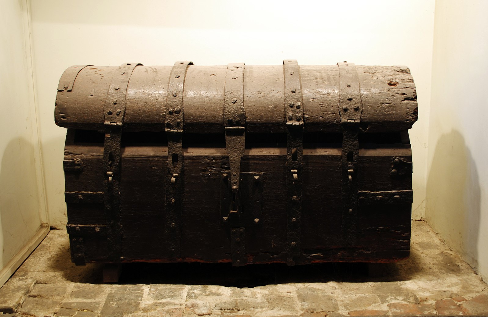 Wooden chest (domed lid) with fittings, 17th c.