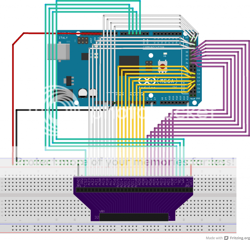 An Arduino Mega 2560 with a rainbow of wires connecting to another circuit board with a GBA cartridge sticking out of it